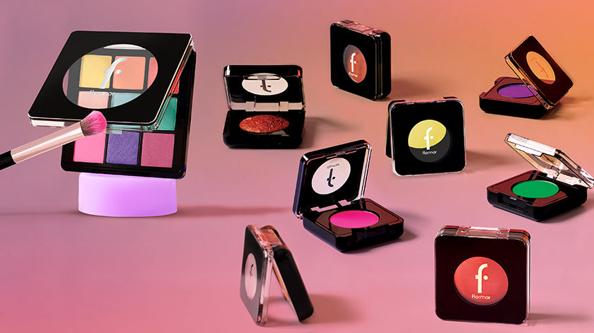 Flormar eyeshadow collection featuring vibrant palettes and single shades, available in Lebanon, displayed on a gradient pink and orange background.